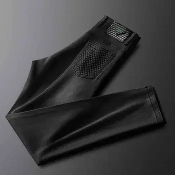 Svetlo luxusné kvalitné kožené značky pánske džínsy jeseň Európskej tovaru bežné Americké svetlo business pánske nohavice pekný